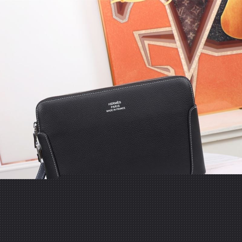 H**mes clutch bags